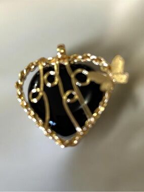 Gold-Tone Heart Pendant with Black Onyx Inset and Butterfly Accent